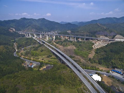 Aerial photography at viaduct with mountain