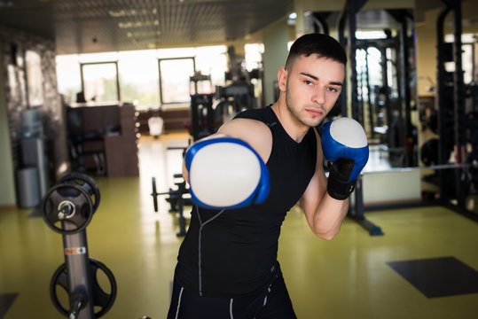 Man Boxing At Gym
