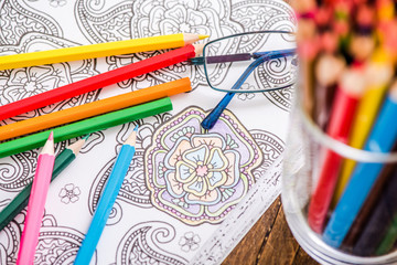 relaxing with adult coloring book