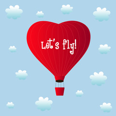 aerostats heart red flying in clouds