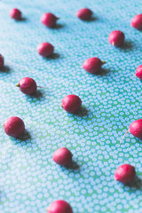 red radishes on floral colorful trendy background, healthy food