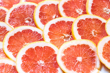 Close up of sliced grapefruit as a background.
