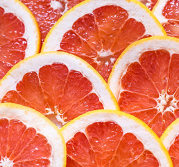 Close up of sliced grapefruit as a background.