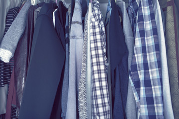 Wardrobe with mans casual wear.