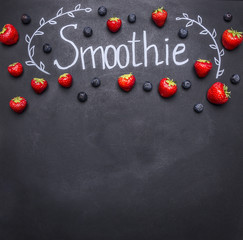 Fresh organic Smoothie ingredients. Superfoods and health or detox diet food concept. concept cooking smoothies from fruit and vegetables, on the chalk board, with space for text
