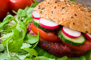 Veggie beet burger on wood table
