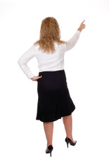 Business woman pointing up.