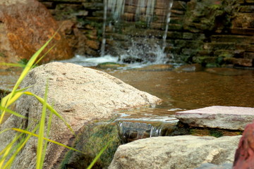 Flow of water./The flow of water from an artificial waterfall.