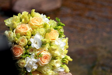 Wedding bouquet./Wedding bouquet near the stream.