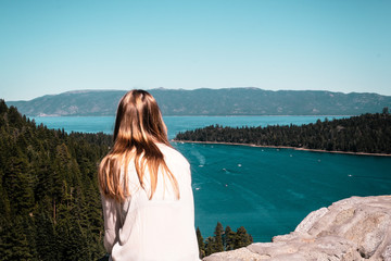 Girl looking at Emerald Bay and Lake Tahoe