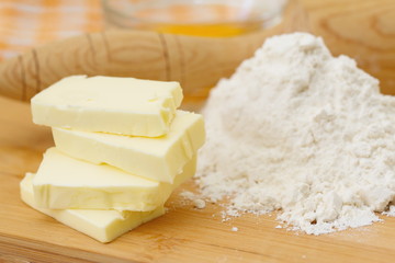 Baking ingredients: butter, eggs and flour