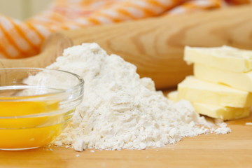 Baking ingredients: butter, eggs and flour