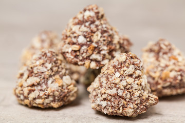 Mix of chocolate on wooden table, close-up