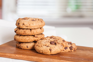 freshly baked chocolate chip cookies on table. Selective focus.