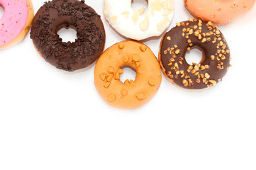 Delicious donuts with icing isolated on white