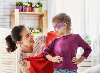 Mother and her child playing