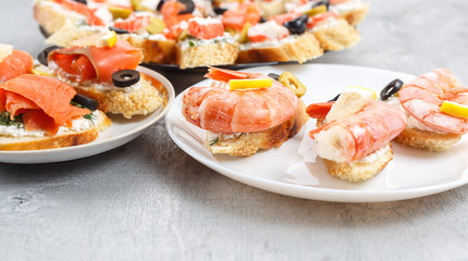 Tasty various italian sandwiches with seafood