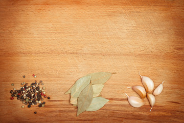 Spices on wooden framed background