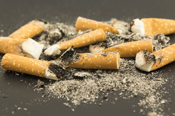 Cigarette Butts  on a Black Background