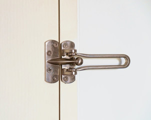 Padlock / Close up padlock on white door.