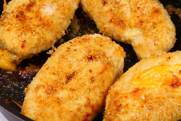 Chicken Breasts Stuffed with Cheese and Ham in Pan
