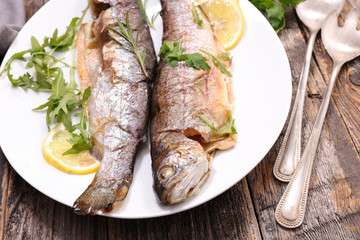 baked fish and salad
