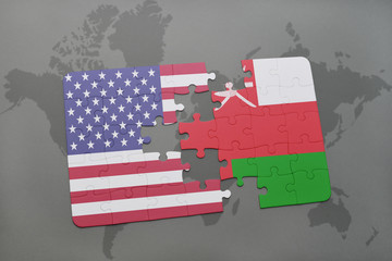 puzzle with the national flag of united states of america and oman on a world map background