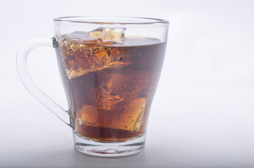 soda with ice on a white background