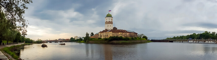 Panorama of ancient white castle of Vyborg was founded by Swedes in 1293, during the Third crusade...