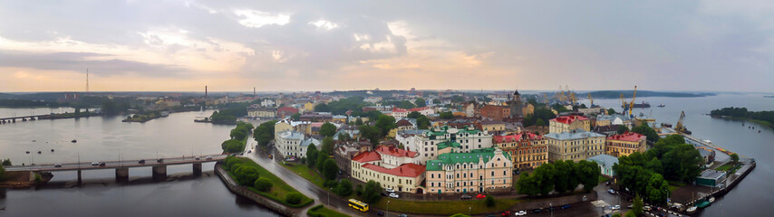 Fototapeta na wymiar Panorama of the city of Vyborg from the top. Capital city of Russia, founded in the Middle ages the Swedes. In 1293 during the Crusades in the land of Karelians, swedes built a castle Vyborg.