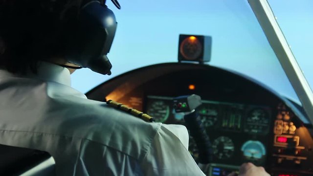Nervous pilot navigating plane despite turbine engine failure, stressful job