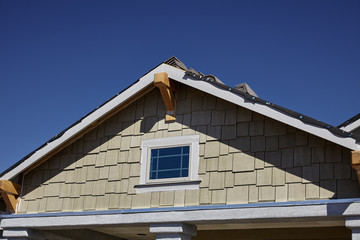 New home gable shingles roofing and stucco