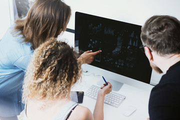 Coworkers Team Working Office Startup.Business Crew work Modern Desktop Monitor Wood Table.Bank Managers Market Research Process.Virtual Digital Diagram Screen.Interface Concept.Analyze stocks Blurred