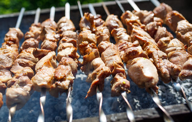 Cooking meat on the fire.