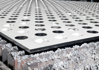 futuristic stainless steel metal, laser cutout on a rustic background