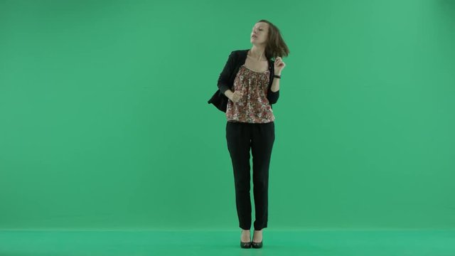 woman dancing against green screen