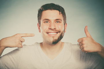 Happy man with half shaved face beard hair.