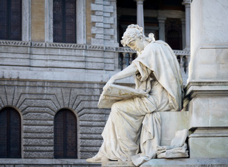 woman reading statue
