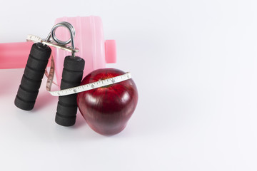 Fitness background with bottle of dumbbell and hand grip