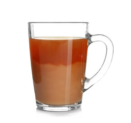 Glass cup of tea with milk isolated on white