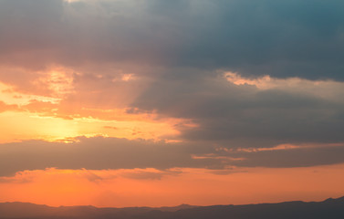 colorful dramatic sky with cloud at sunset