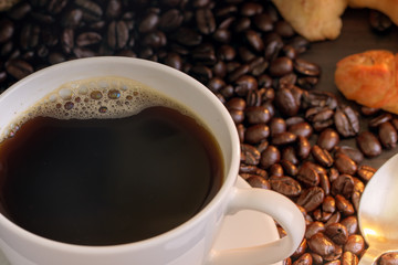 Hot coffee and croissant on wood table