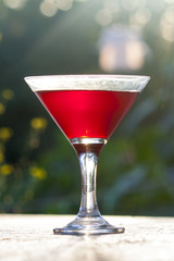 bright red wine in the glass on the table