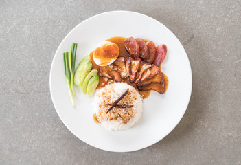 Barbecued red pork in sauce with rice