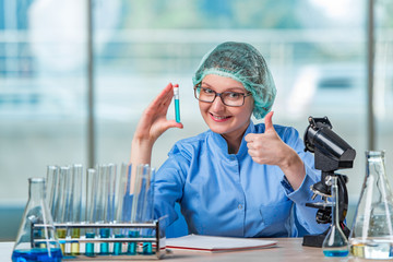 Experienced lab assistant working on chemical solutions