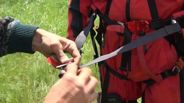 Sportsman Paraglider Before Take-Off. Equipment Preparation Hands Close up