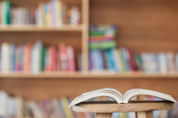 book on chair in the library