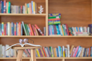 book on chair in the library