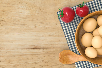 eggs in a bowl with tomatoes