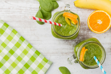 Vegetable and fruit cocktail, served in a jar, with fresh citrus